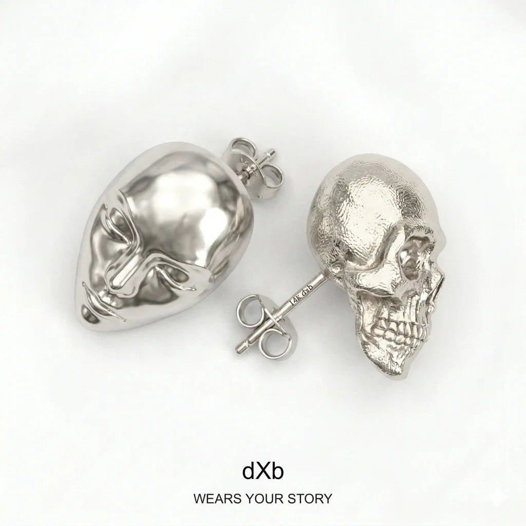 14k Gold Skull & Face Statement Stud Earrings in High Polished White Gold, 45° overhead view