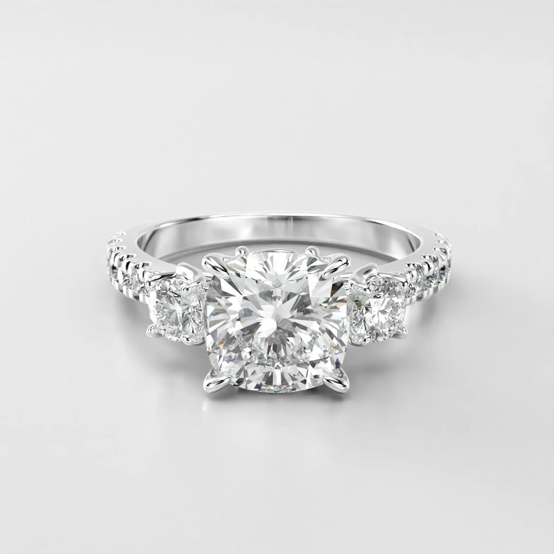 Platinum Front view of the Art Nouveau Three Stone Pave Ring.