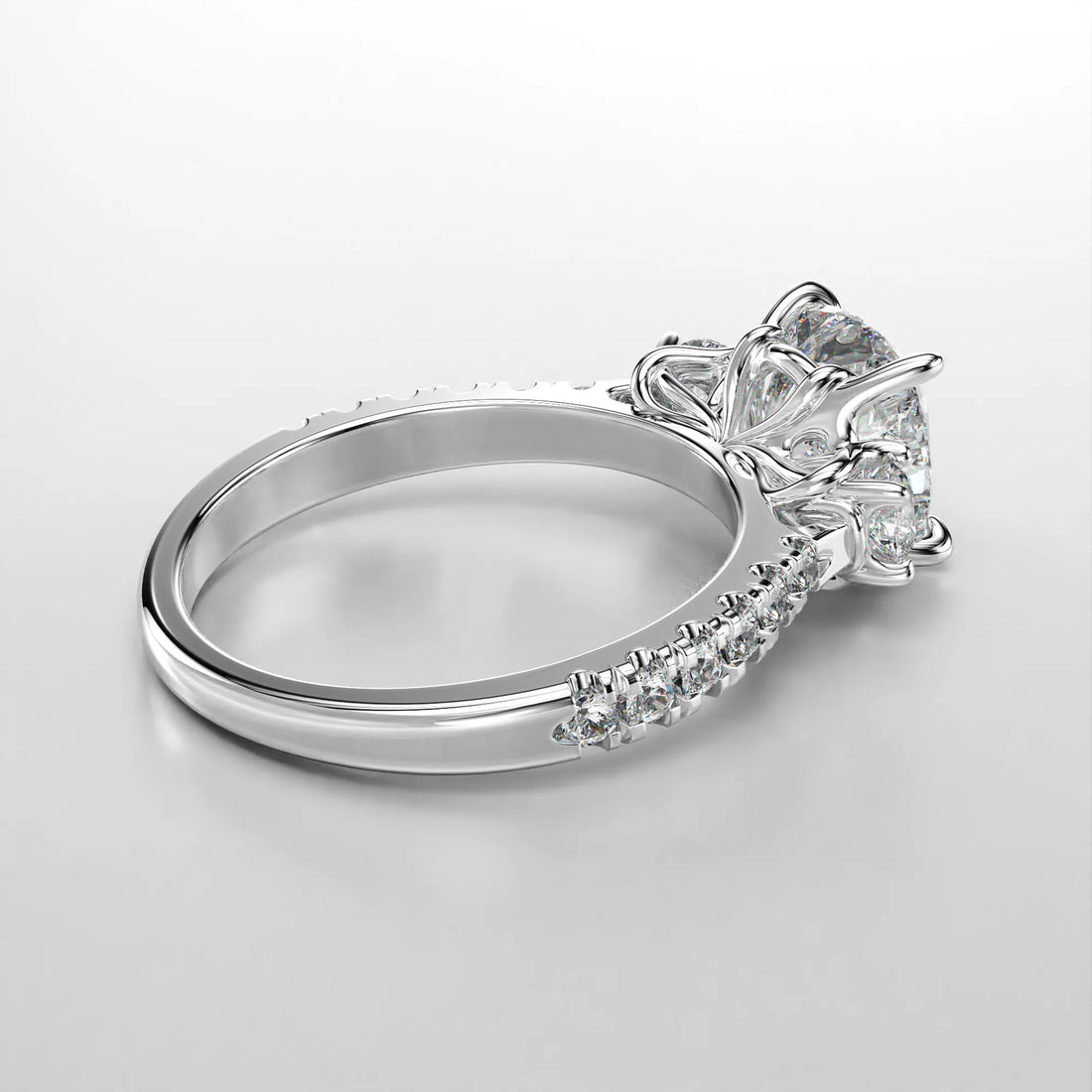 Platinum Side view of the Art Nouveau Three Stone Pave Ring.