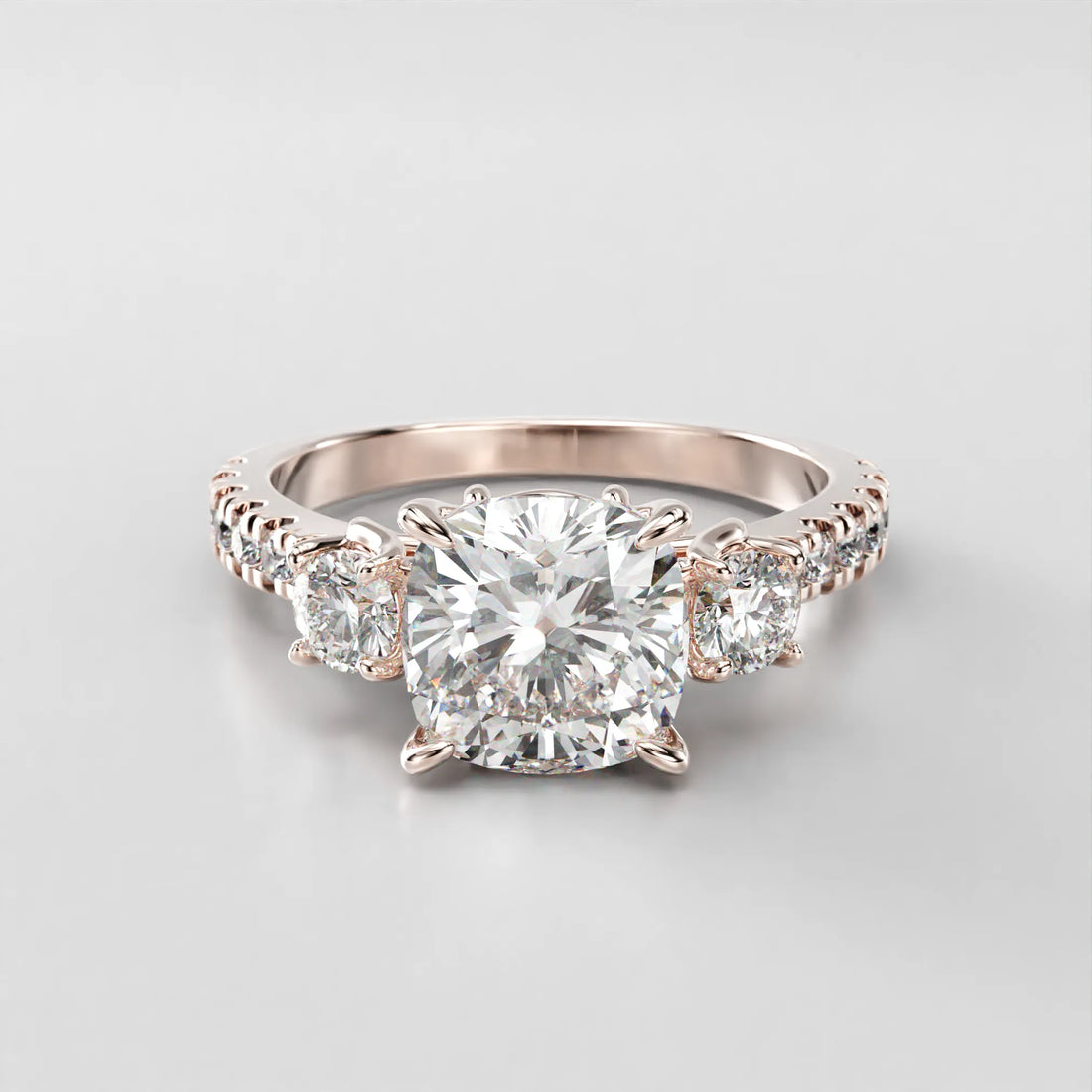 Rose Gold Front view of the Art Nouveau Three Stone Pave Ring.