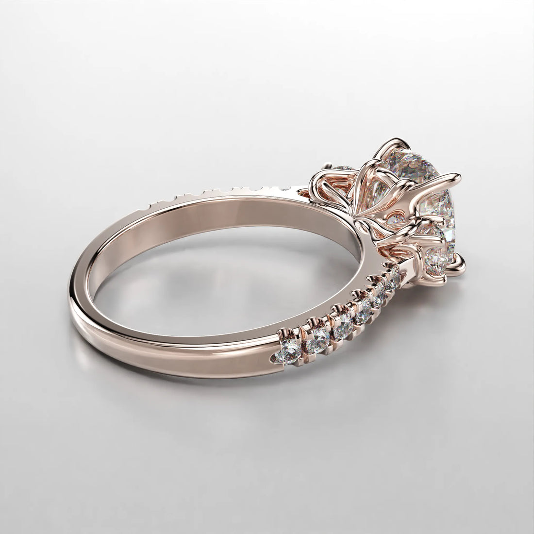 Rose Gold Side view of the Art Nouveau Three Stone Pave Ring.