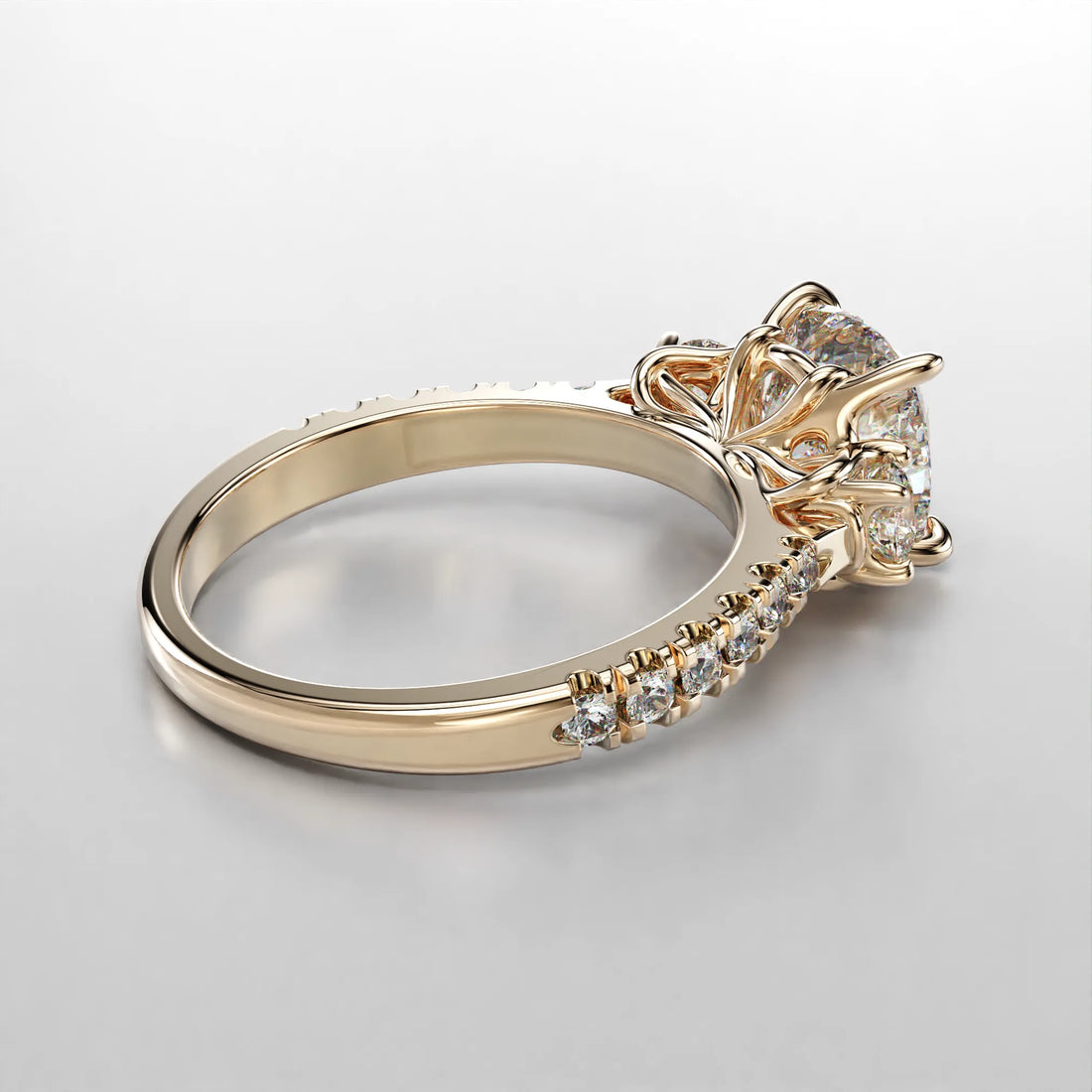 Yellow Gold Side view of the Art Nouveau Three Stone Pave Ring.