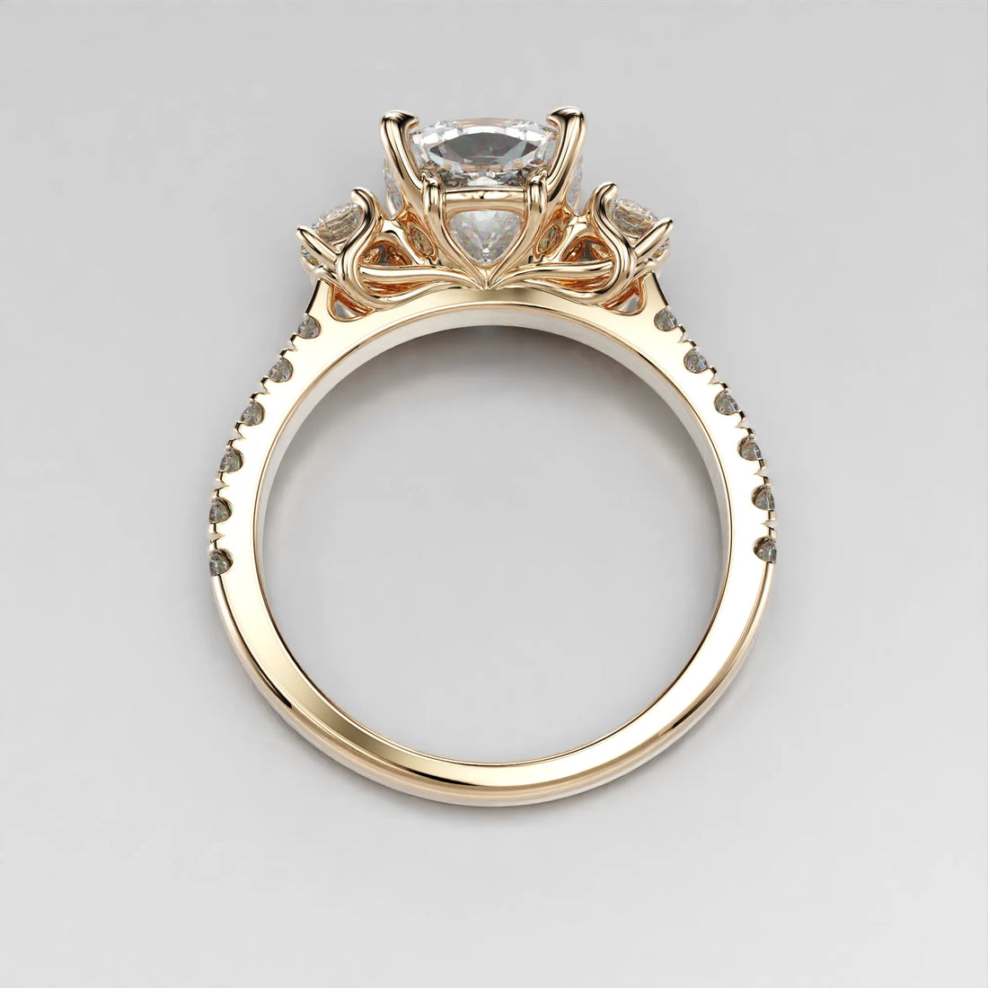 Yellow Gold Top view of the Art Nouveau Three Stone Pave Ring.