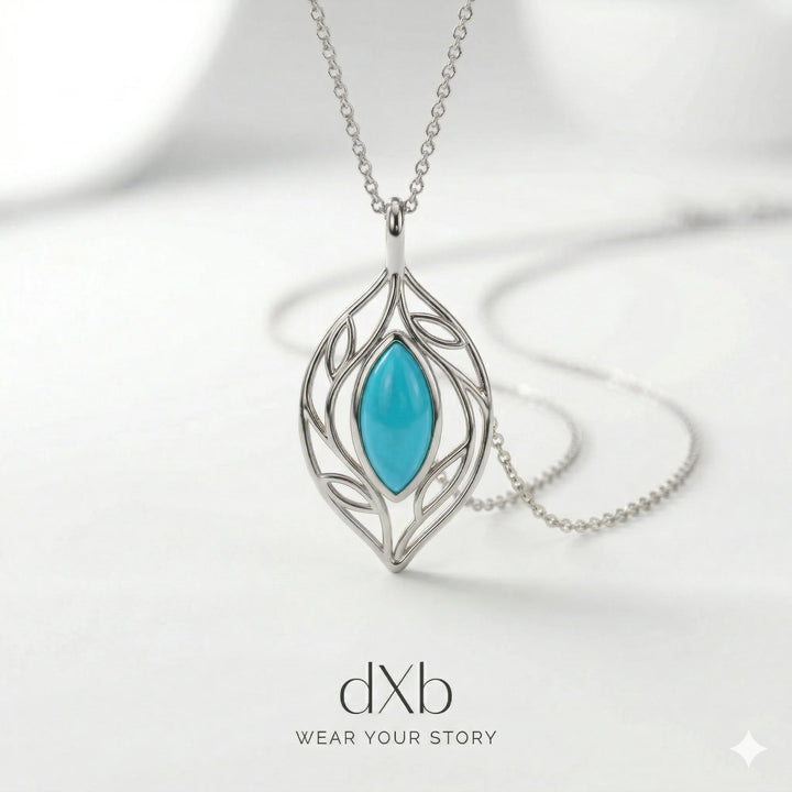 platinum turquoise marquise leaf motif, nature-inspired, delicate pendant