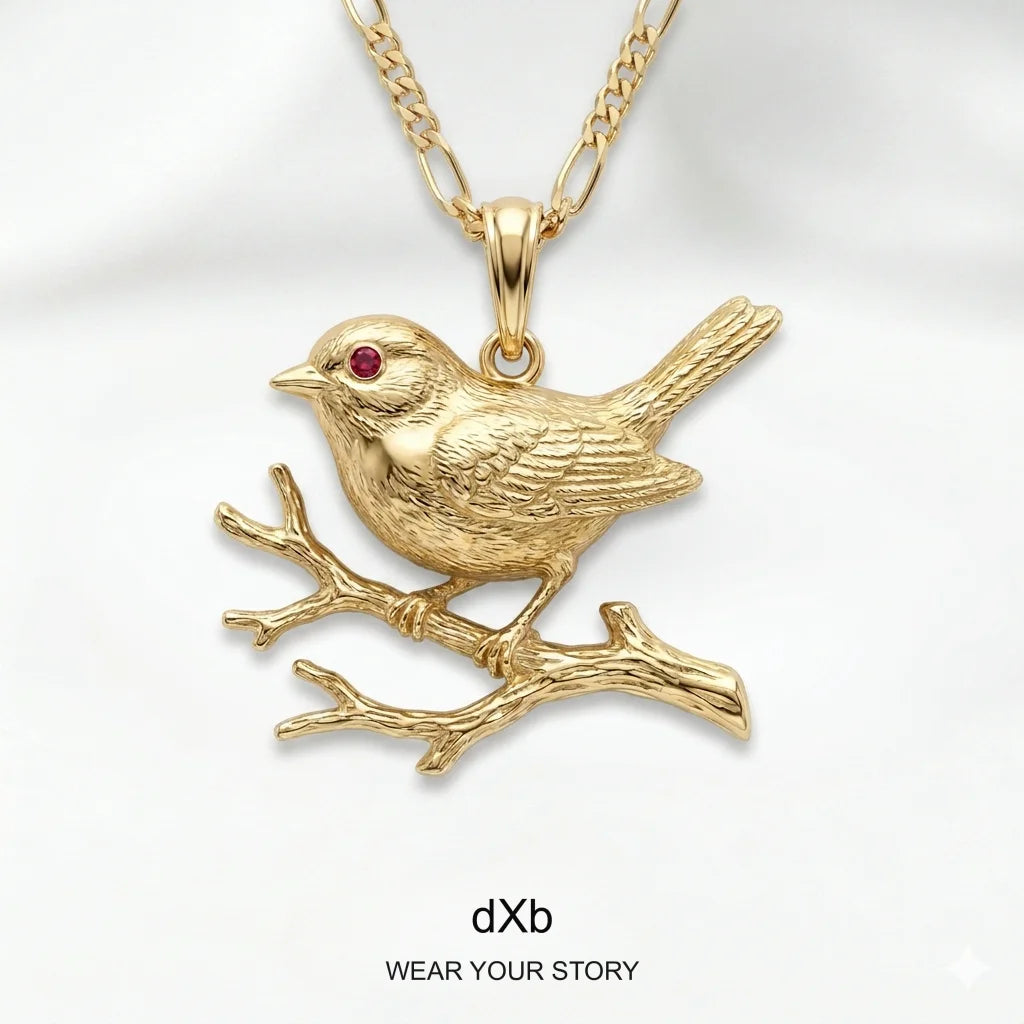 High Polished Silver Oxidized Ruby Bird Pendant in High Polished Yellow Gold, main view