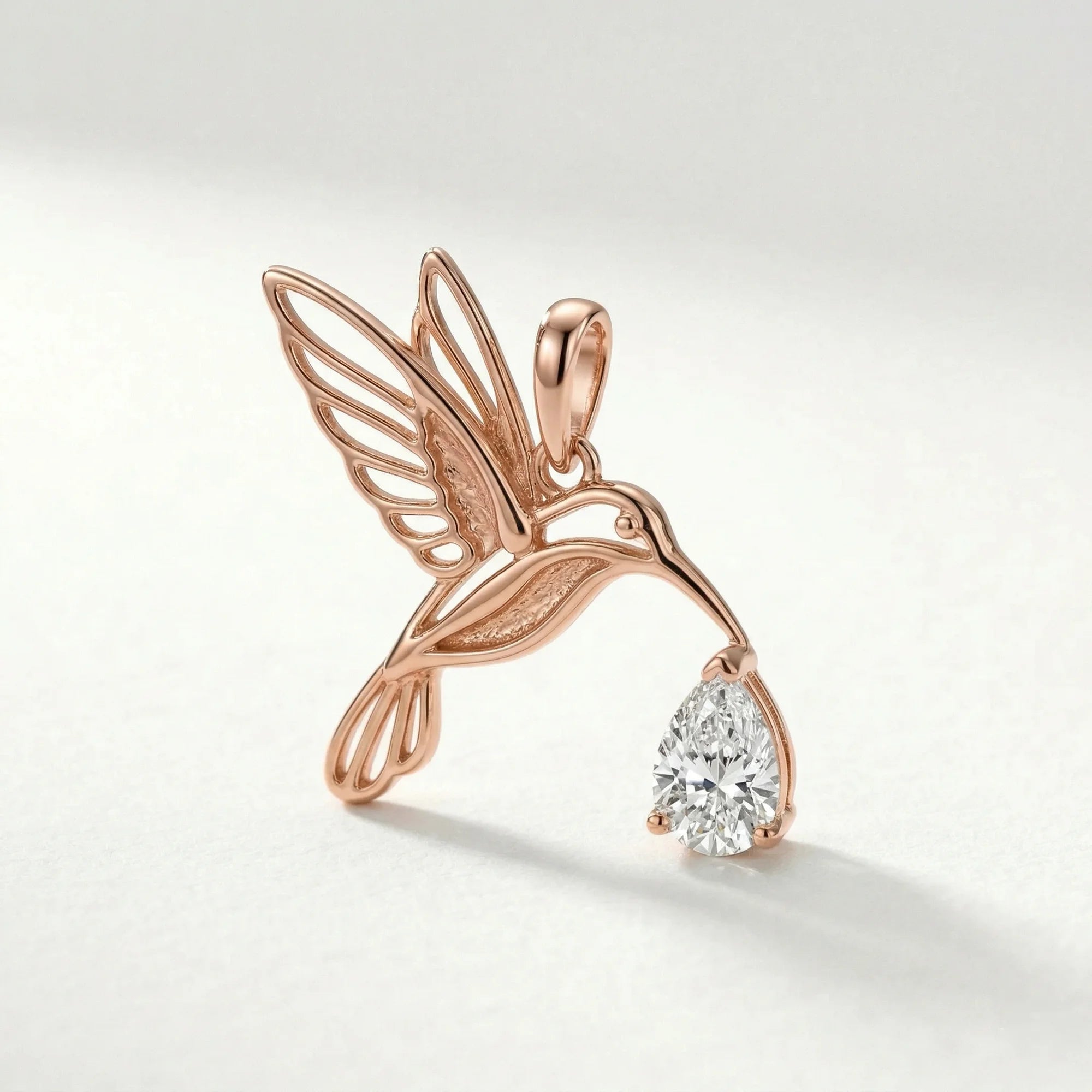 14k rose gold colorless gemstone pear hummingbird motif, nature-inspired, outline pendant