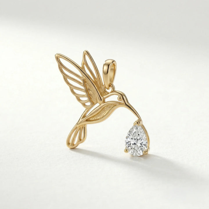 14k yellow gold clear gemstone pear hummingbird, nature, animal motif pendant