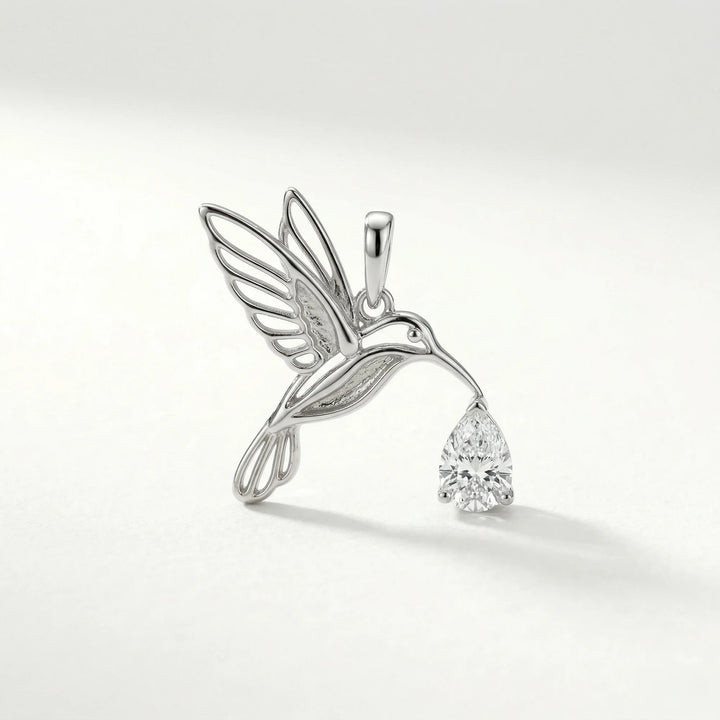 platinum colorless gemstone pear hummingbird motif, nature-inspired, outline pendant