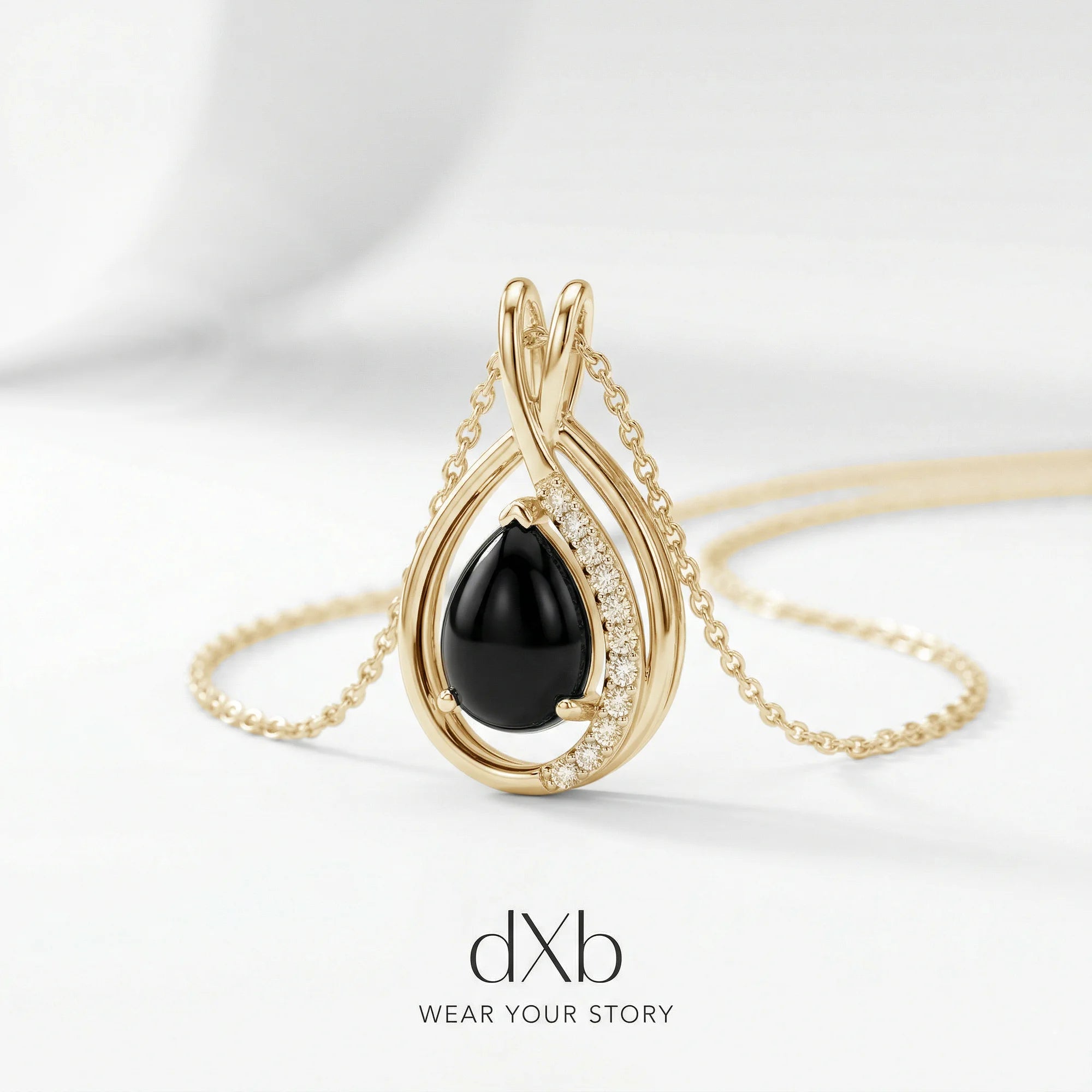 14k yellow gold black onyx pear modern teardrop swirl pendant