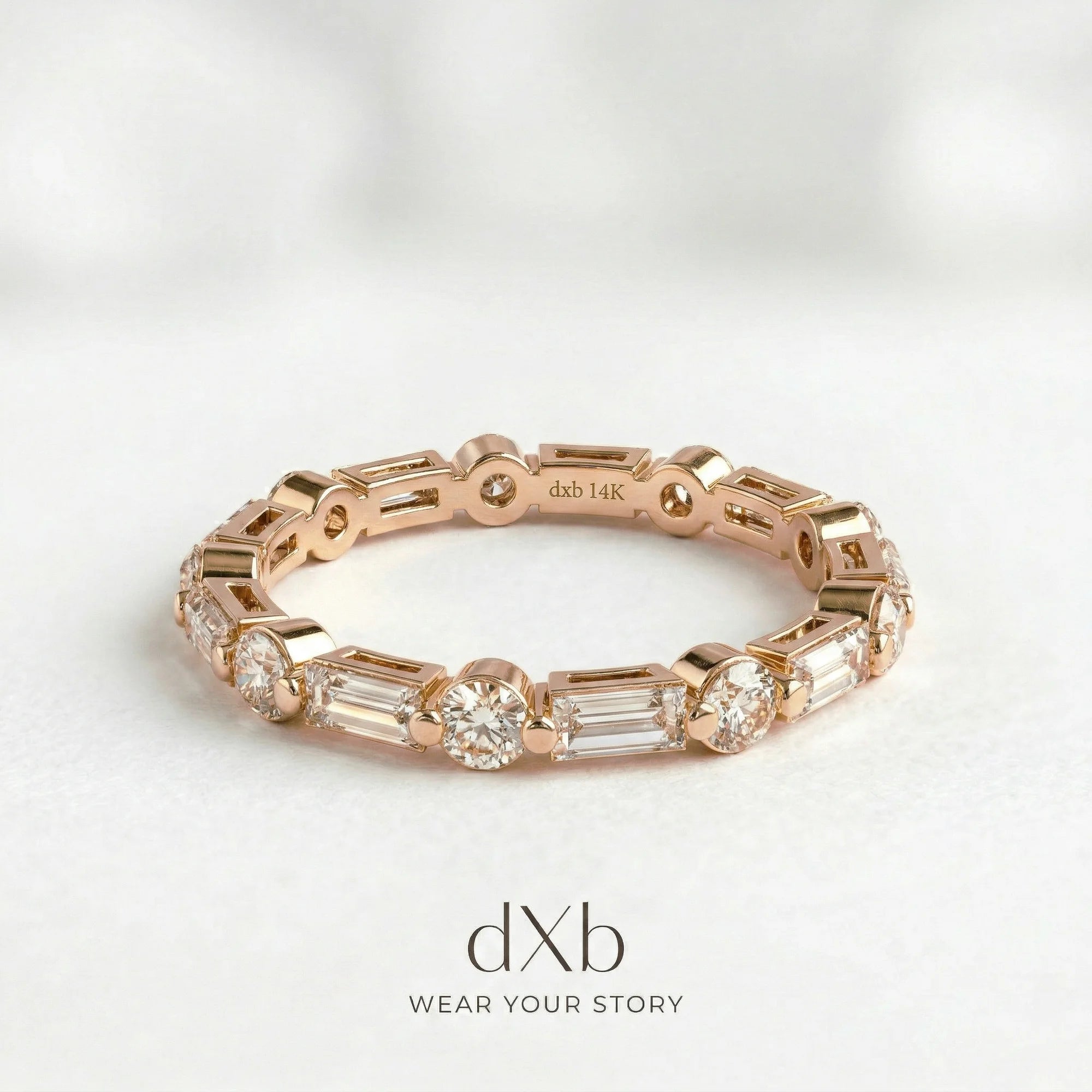 14k rose gold clear simulant round, baguette eternity band, alternating stones ring